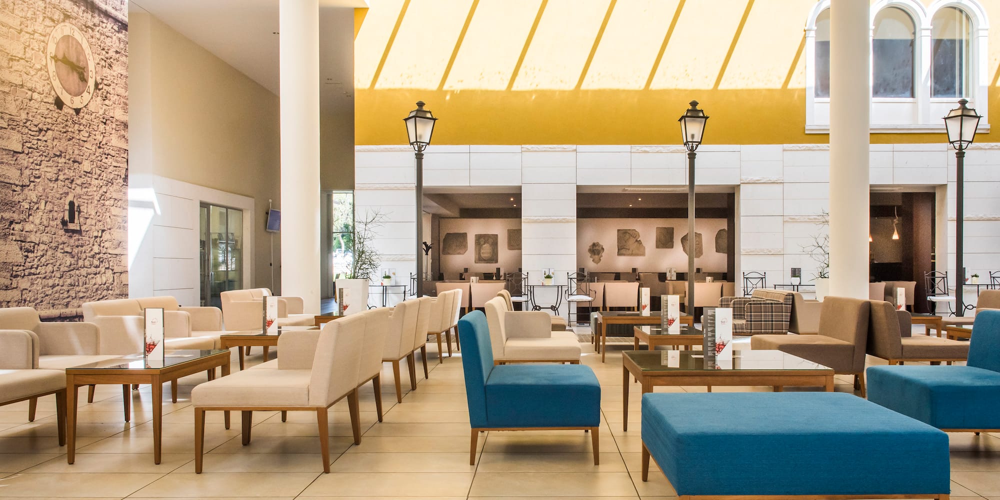 a room with chairs and tables