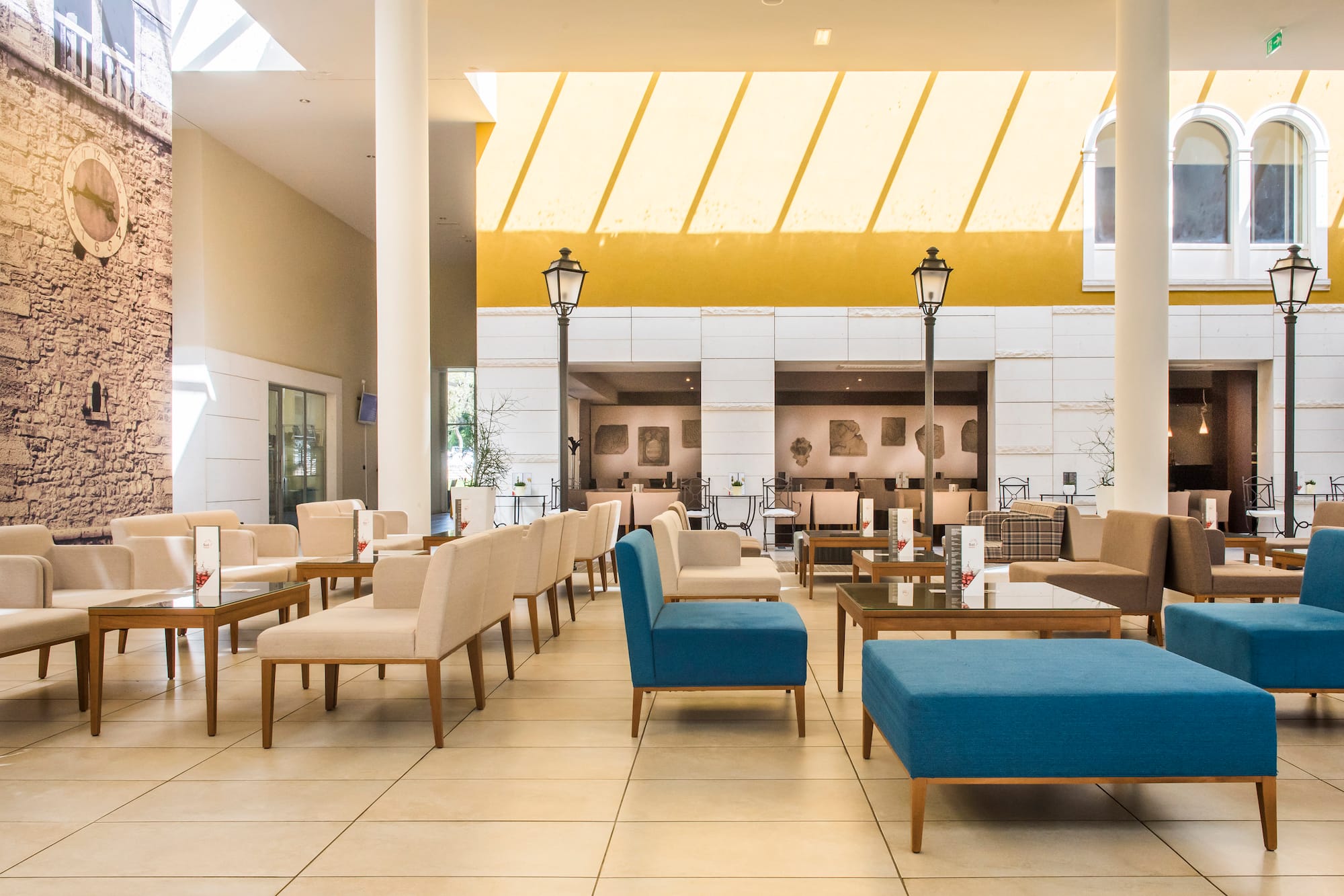 a room with chairs and tables