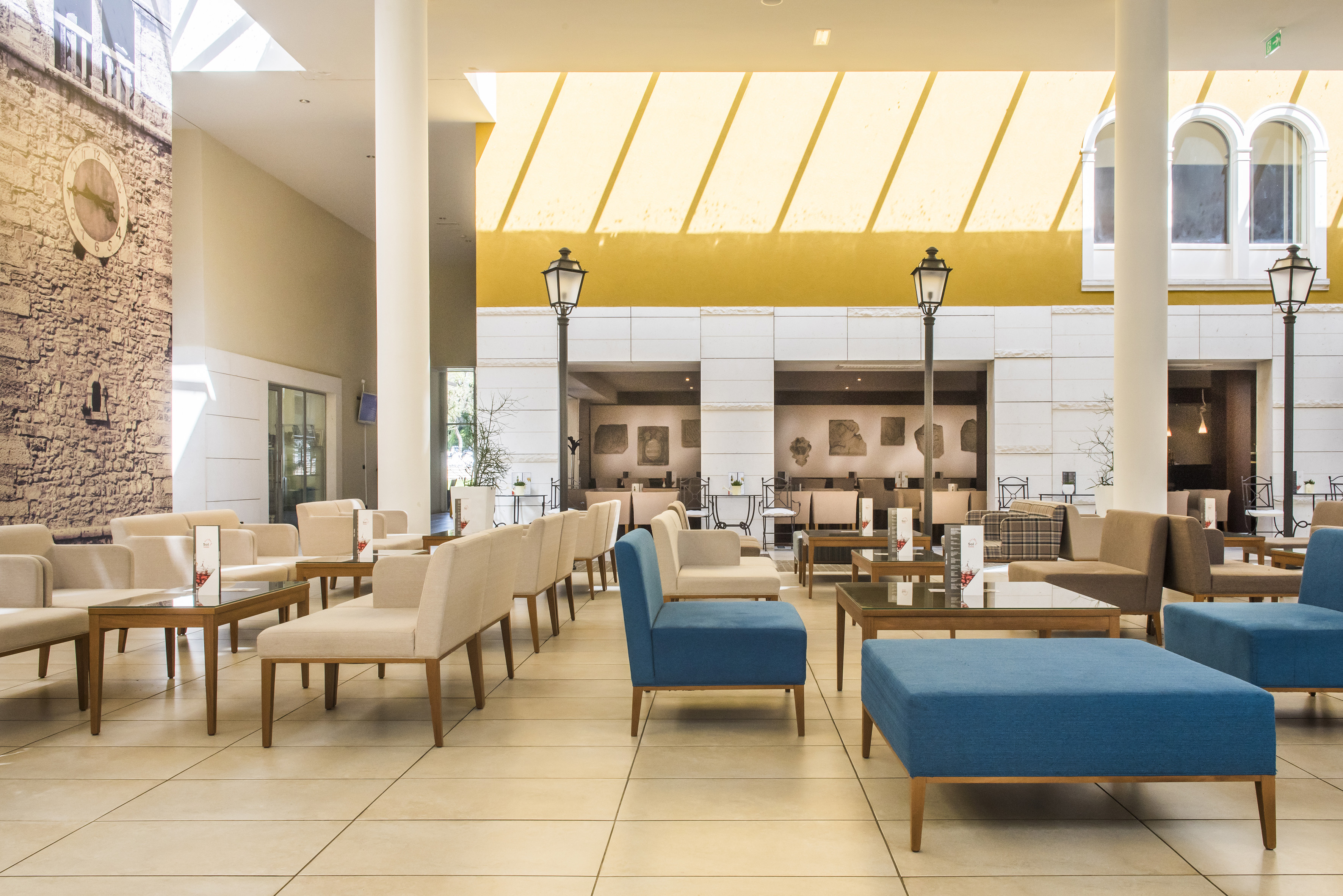 a room with chairs and tables