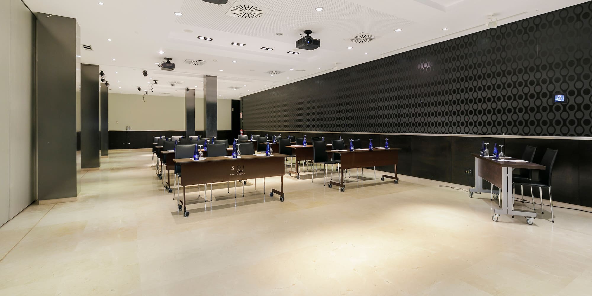 a room with tables and chairs