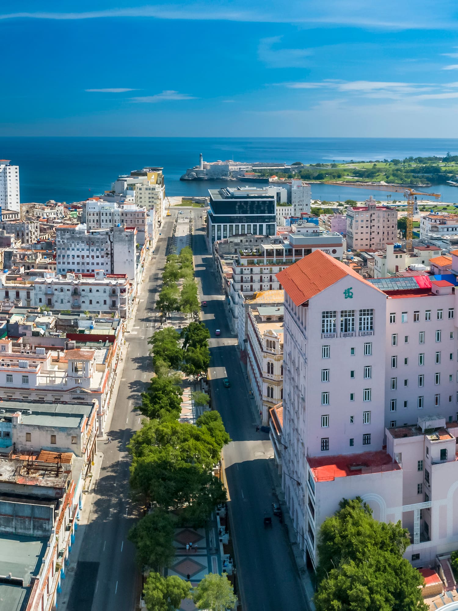 a city with many buildings and a body of water