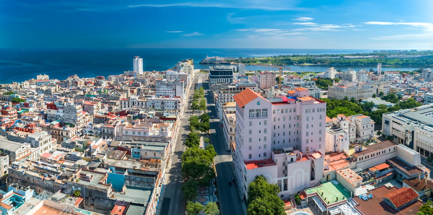 a city with many buildings and a body of water