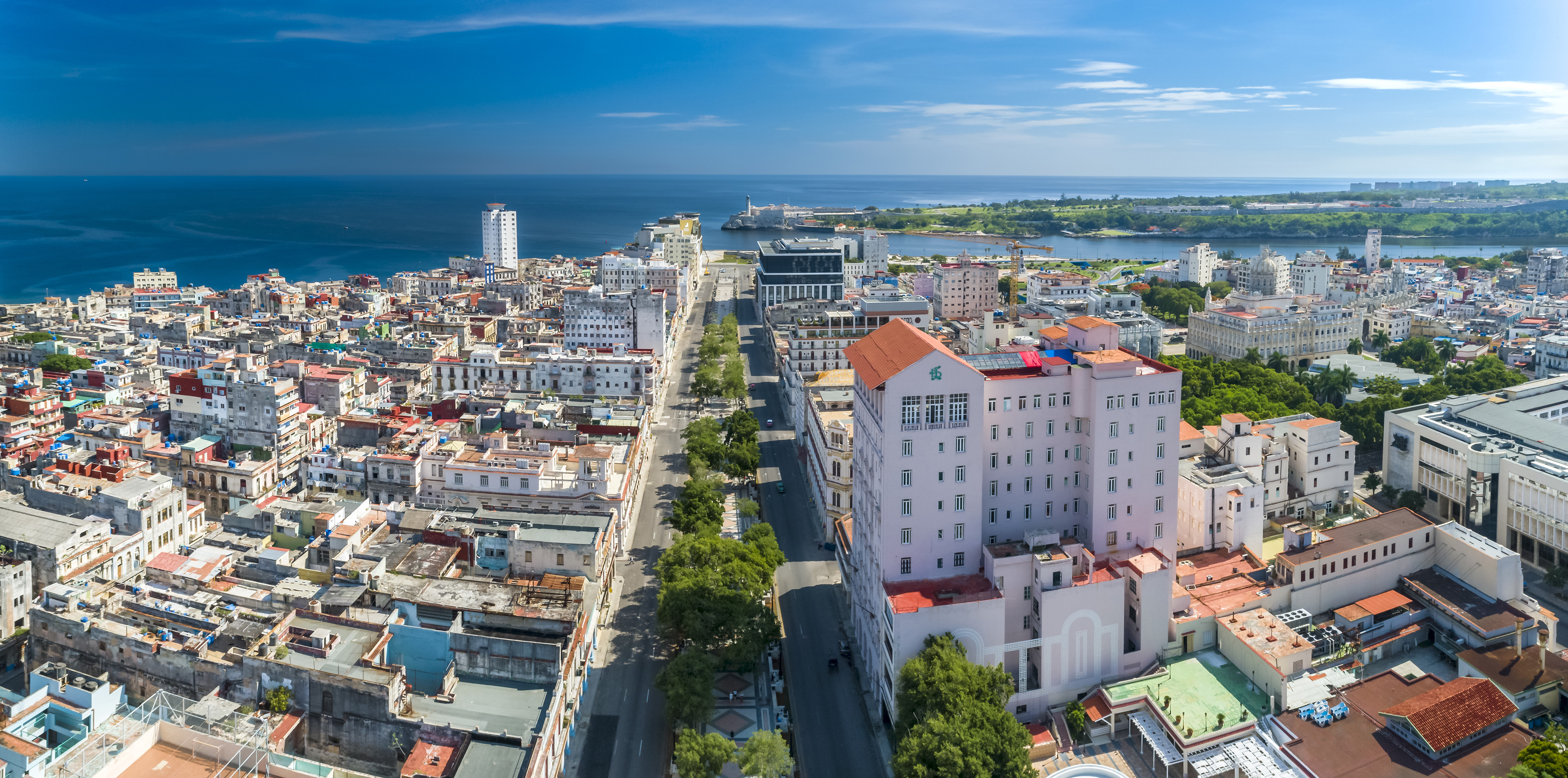 a city with many buildings and a body of water