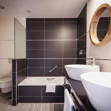 a bathroom with a sink and a toilet