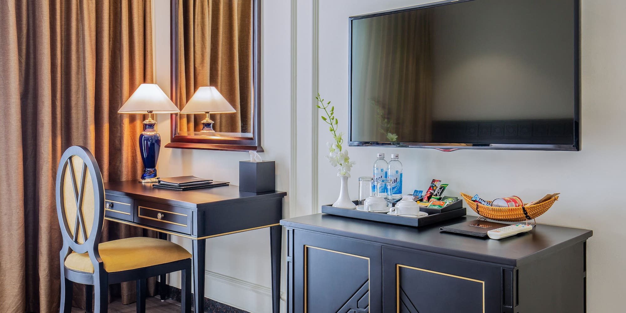 a room with a tv and a table