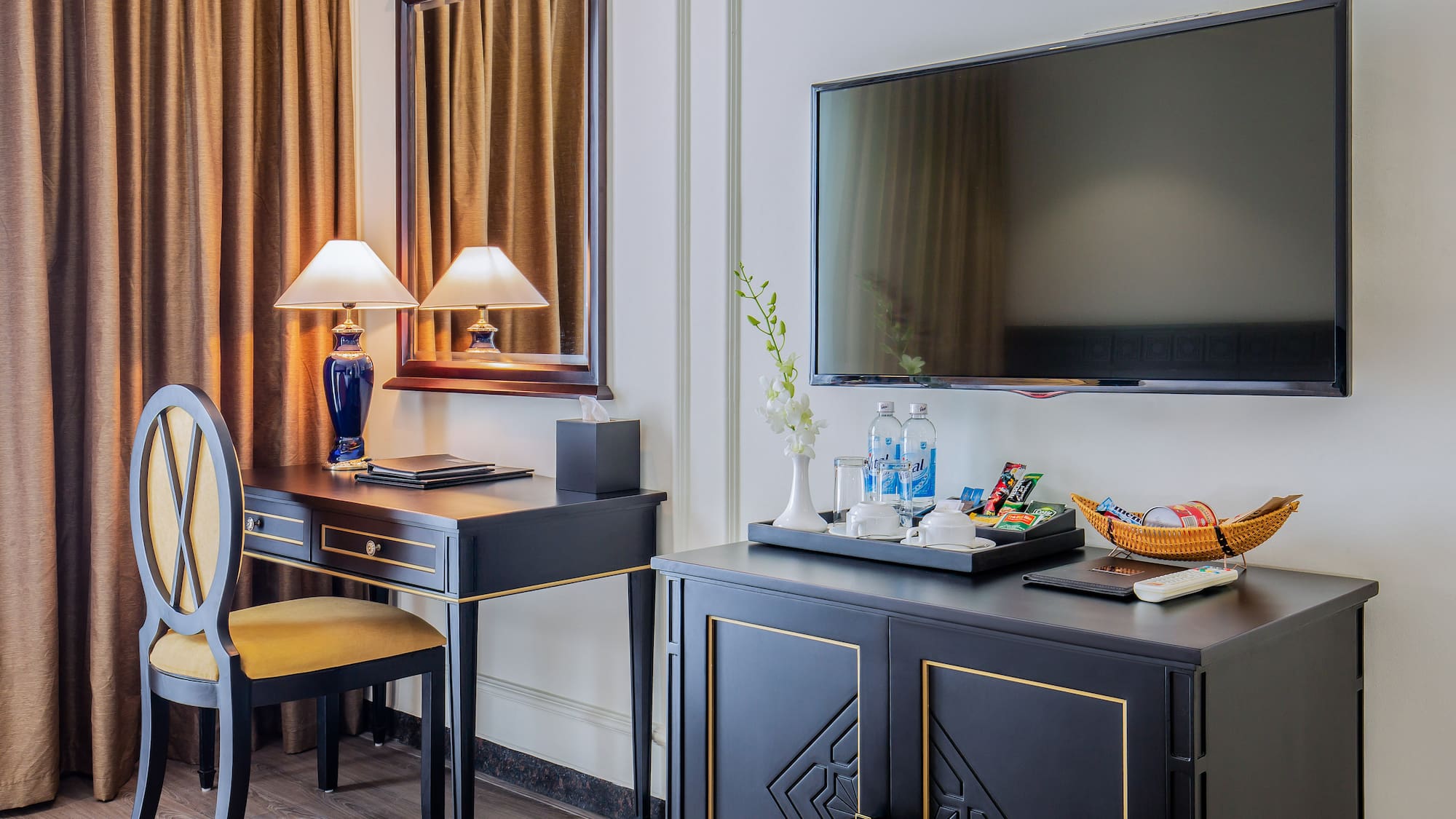 a room with a tv and a table