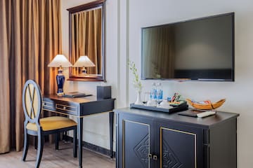 a room with a tv and a table