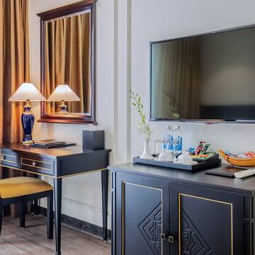 a room with a tv and a table