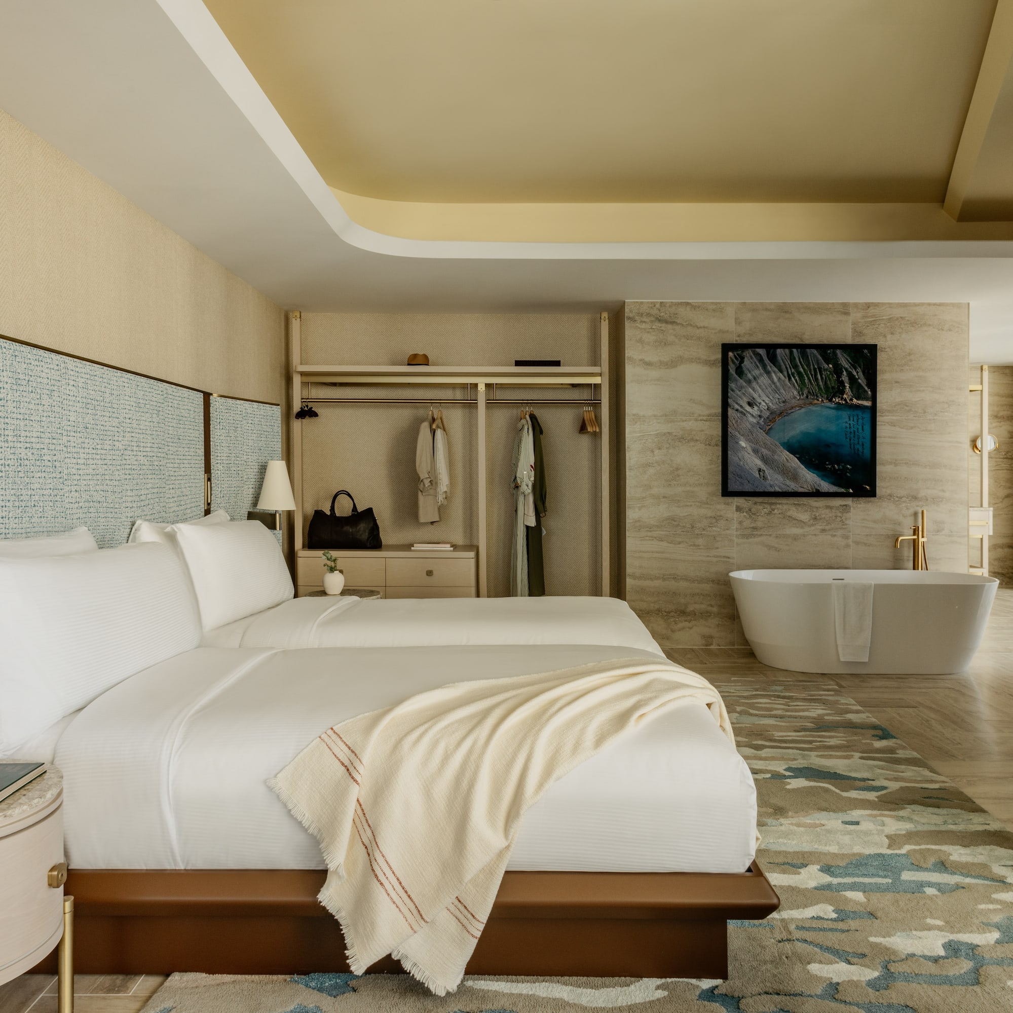 a room with a bed and bathtub