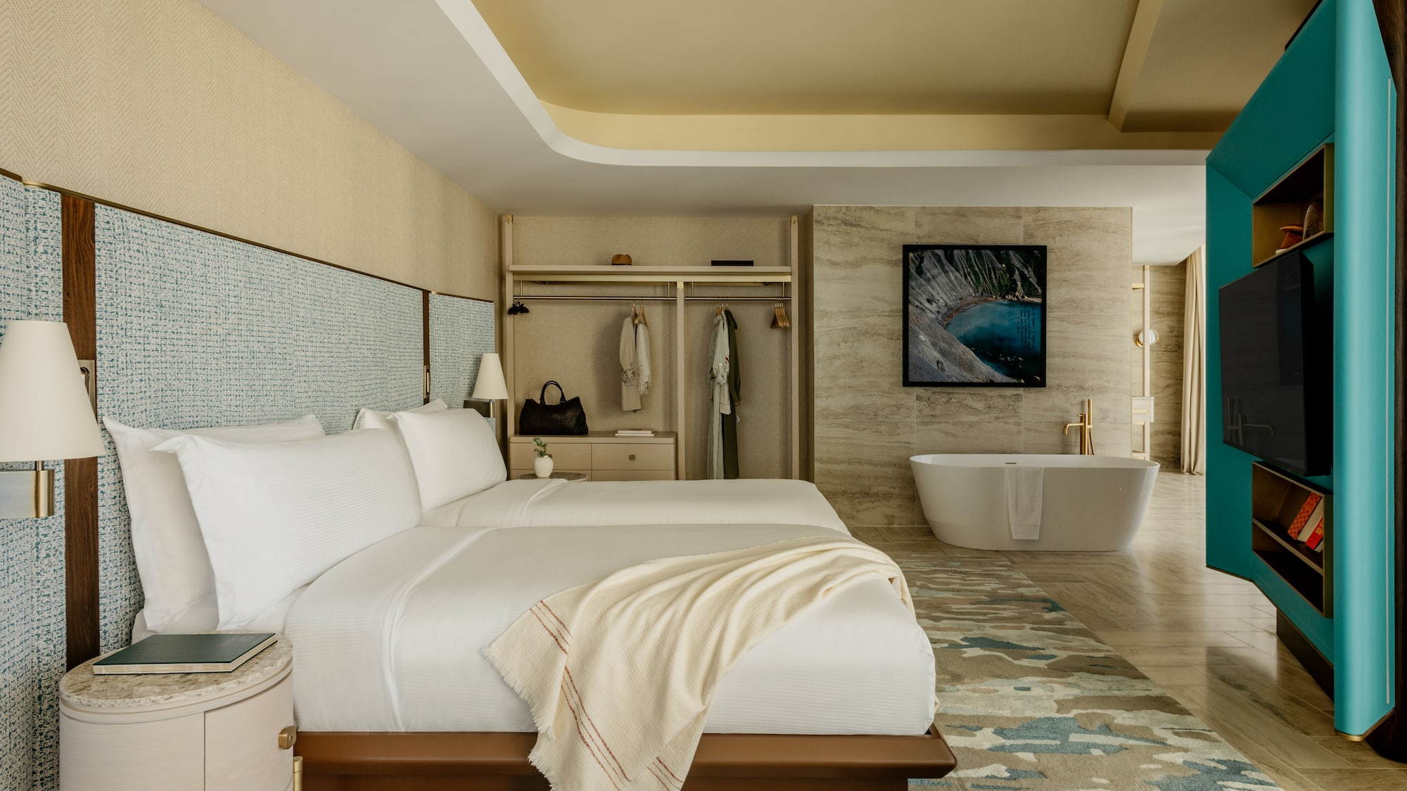 a room with a bed and bathtub