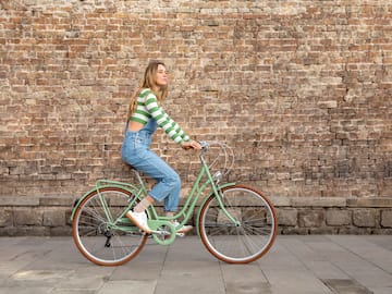 a woman riding a bicycle