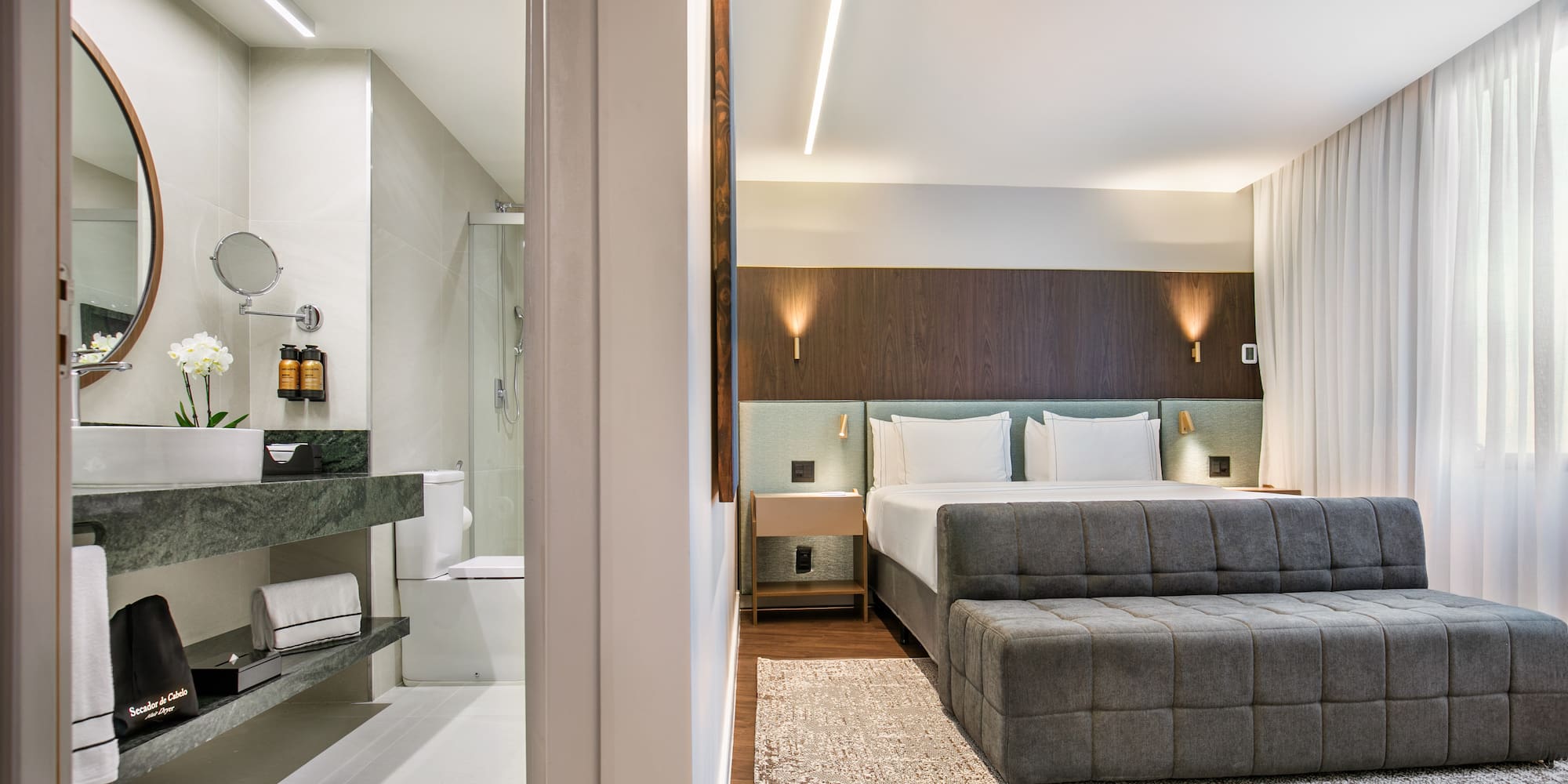 a bedroom with a bed and a sink