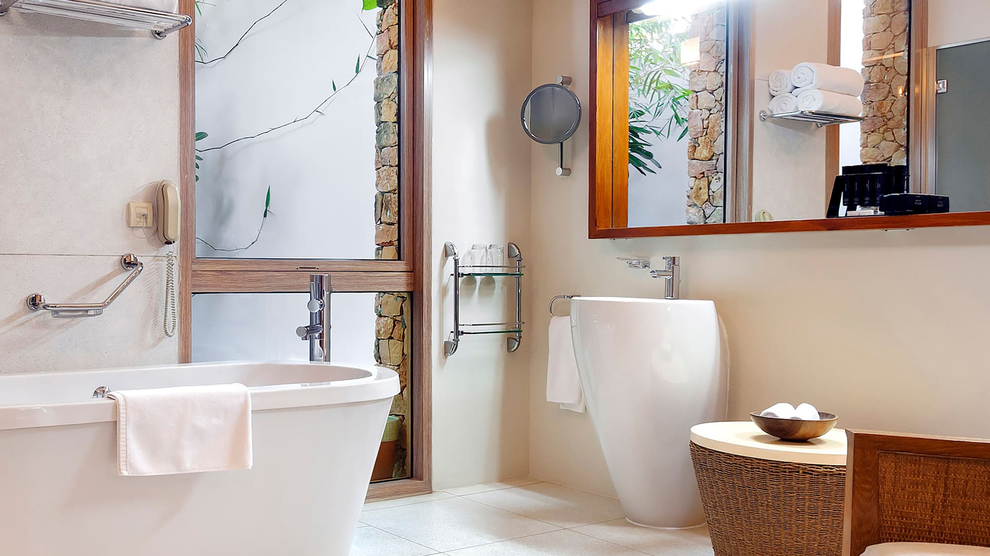 a bathroom with a tub and a mirror