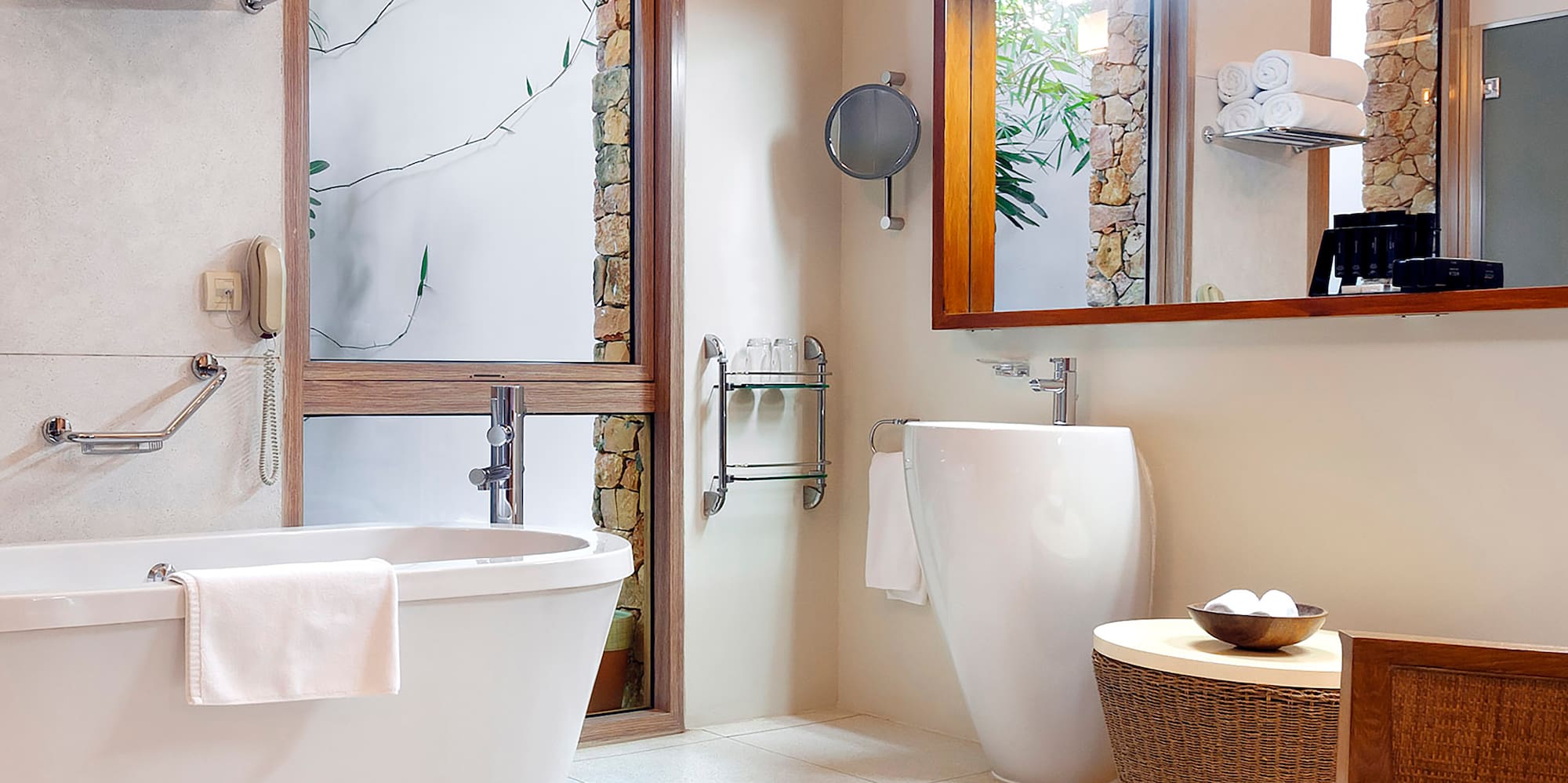 a bathroom with a tub and a mirror