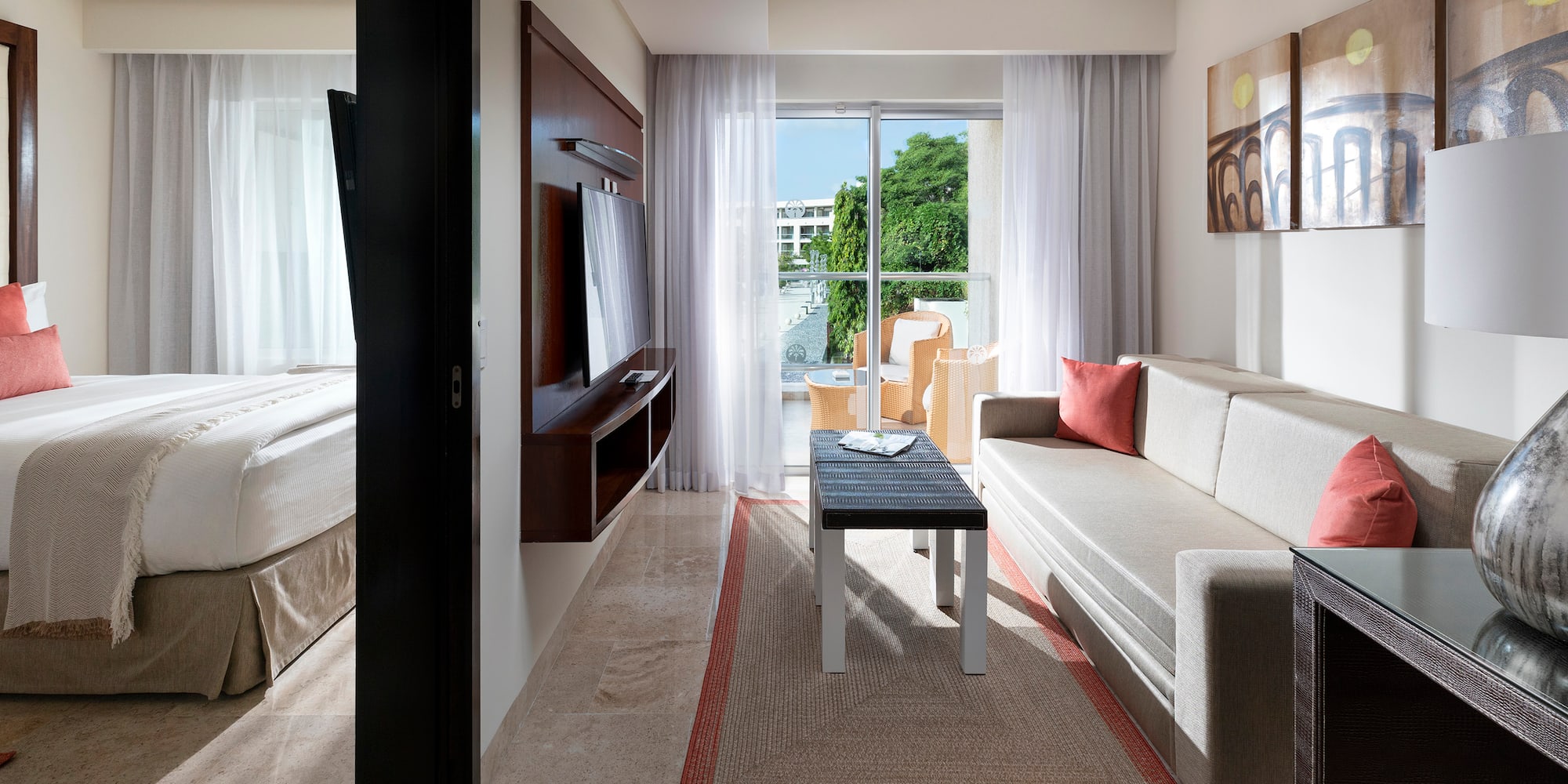 a living room with a couch and a tv