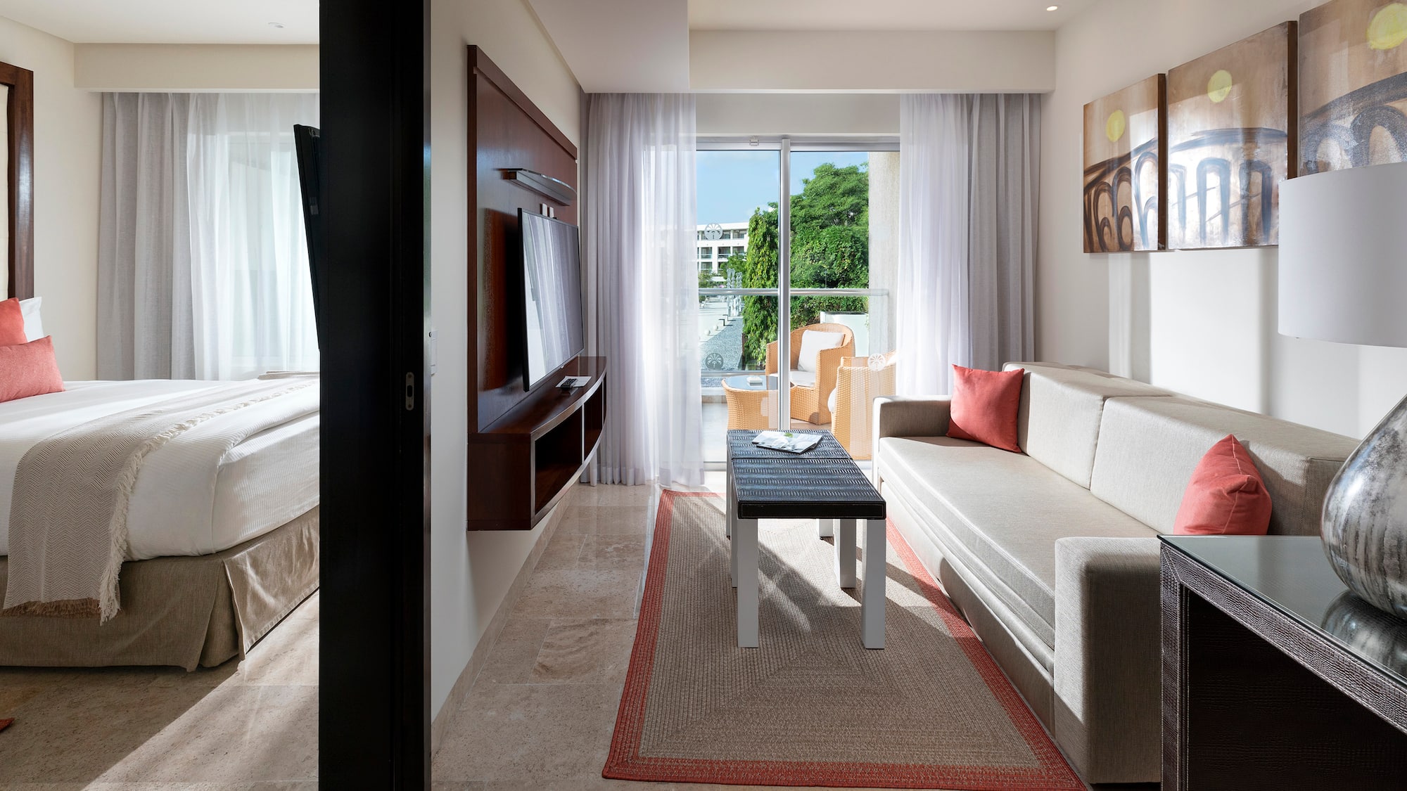 a living room with a couch and a tv