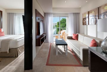 a living room with a couch and a tv