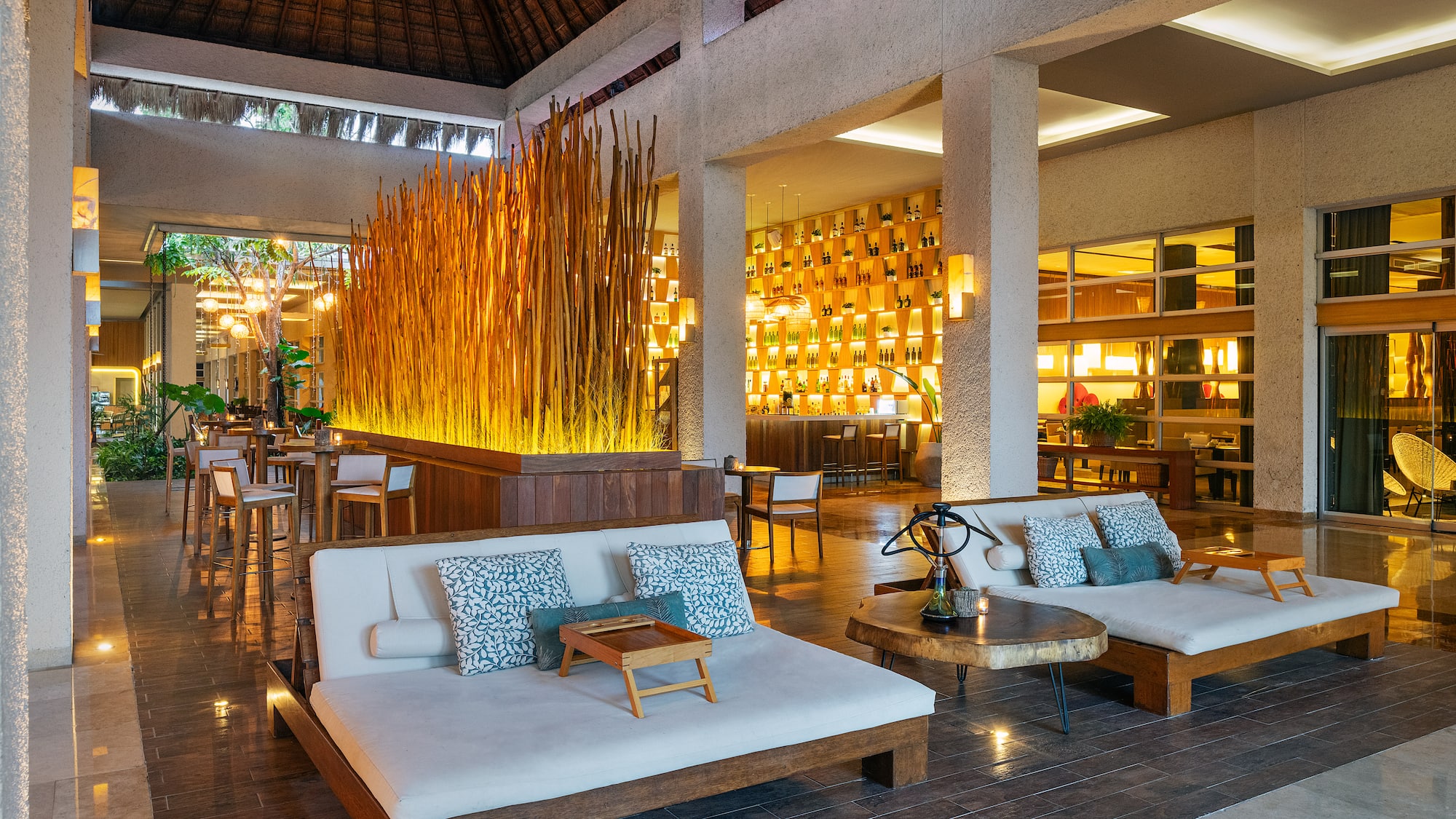 a room with a large wall and a large couch