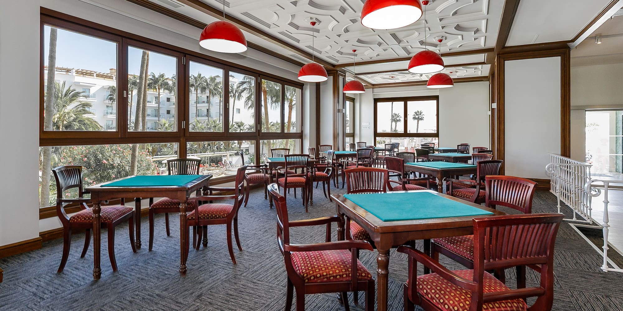 a room with tables and chairs