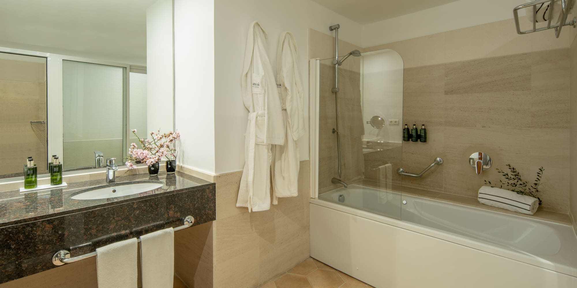 a bathroom with a bathtub and sink