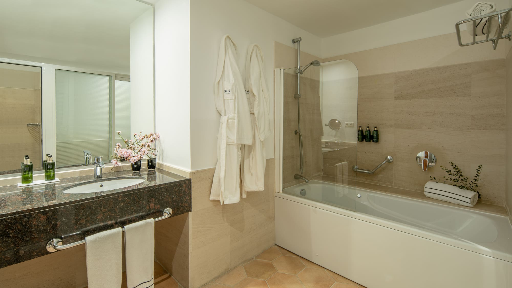 a bathroom with a bathtub and sink
