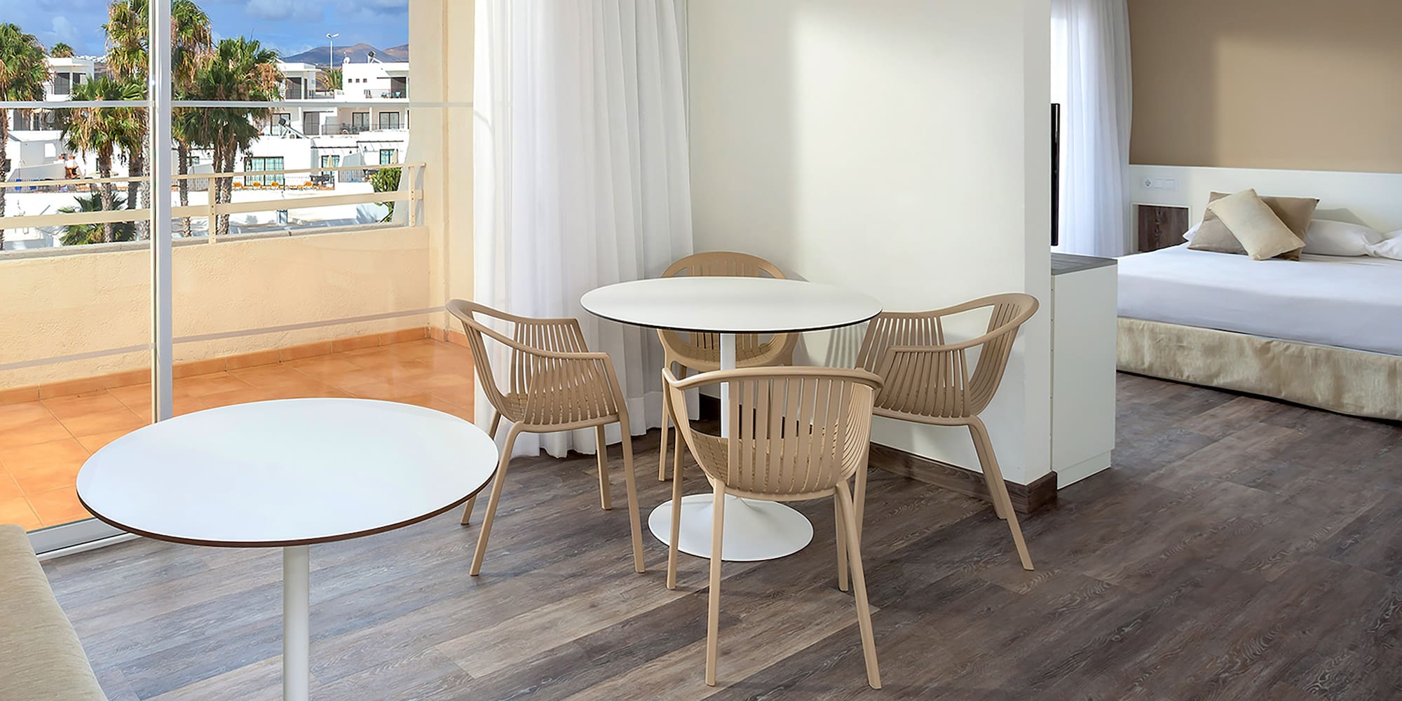 a room with a table and chairs