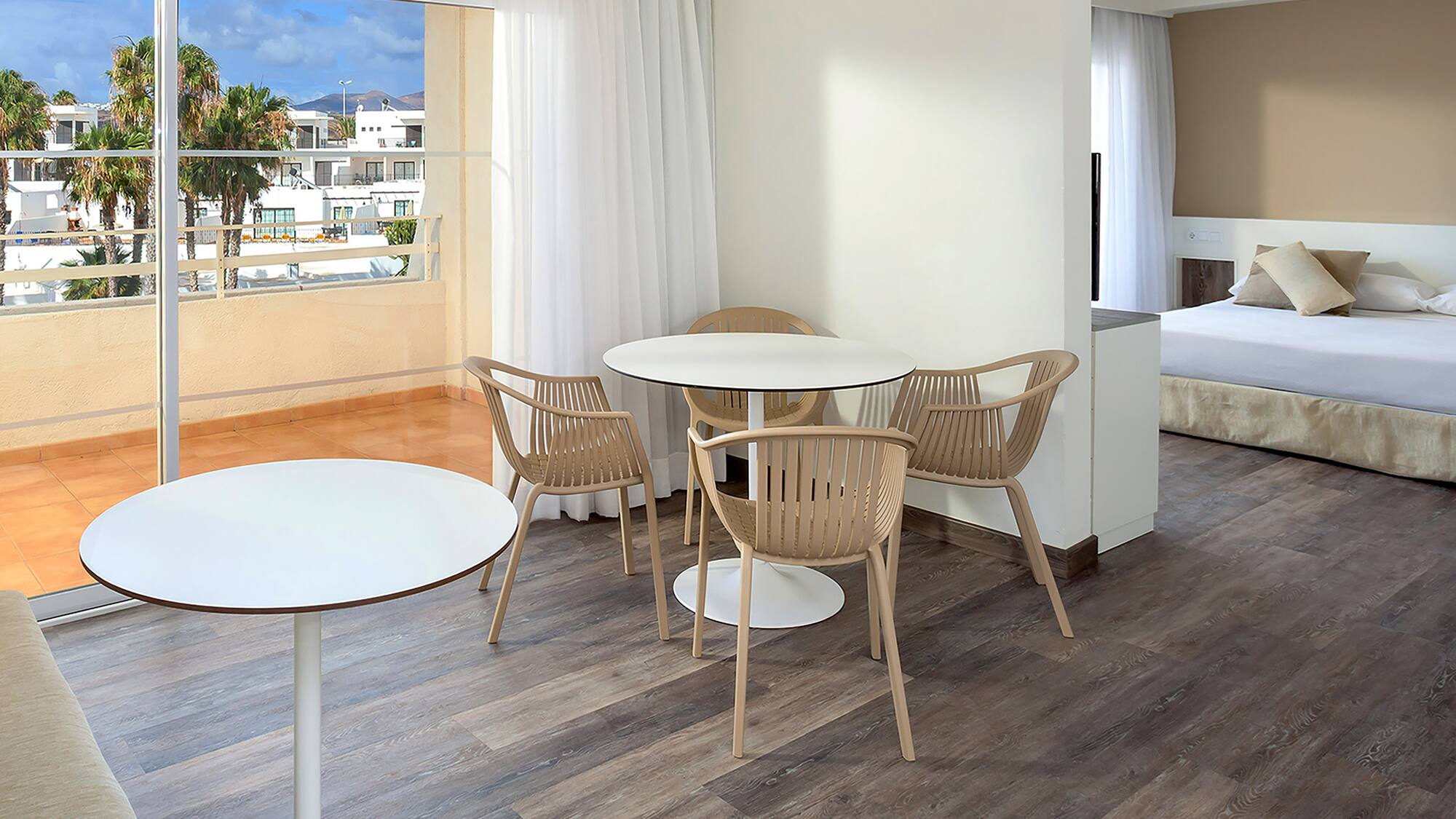 a room with a table and chairs