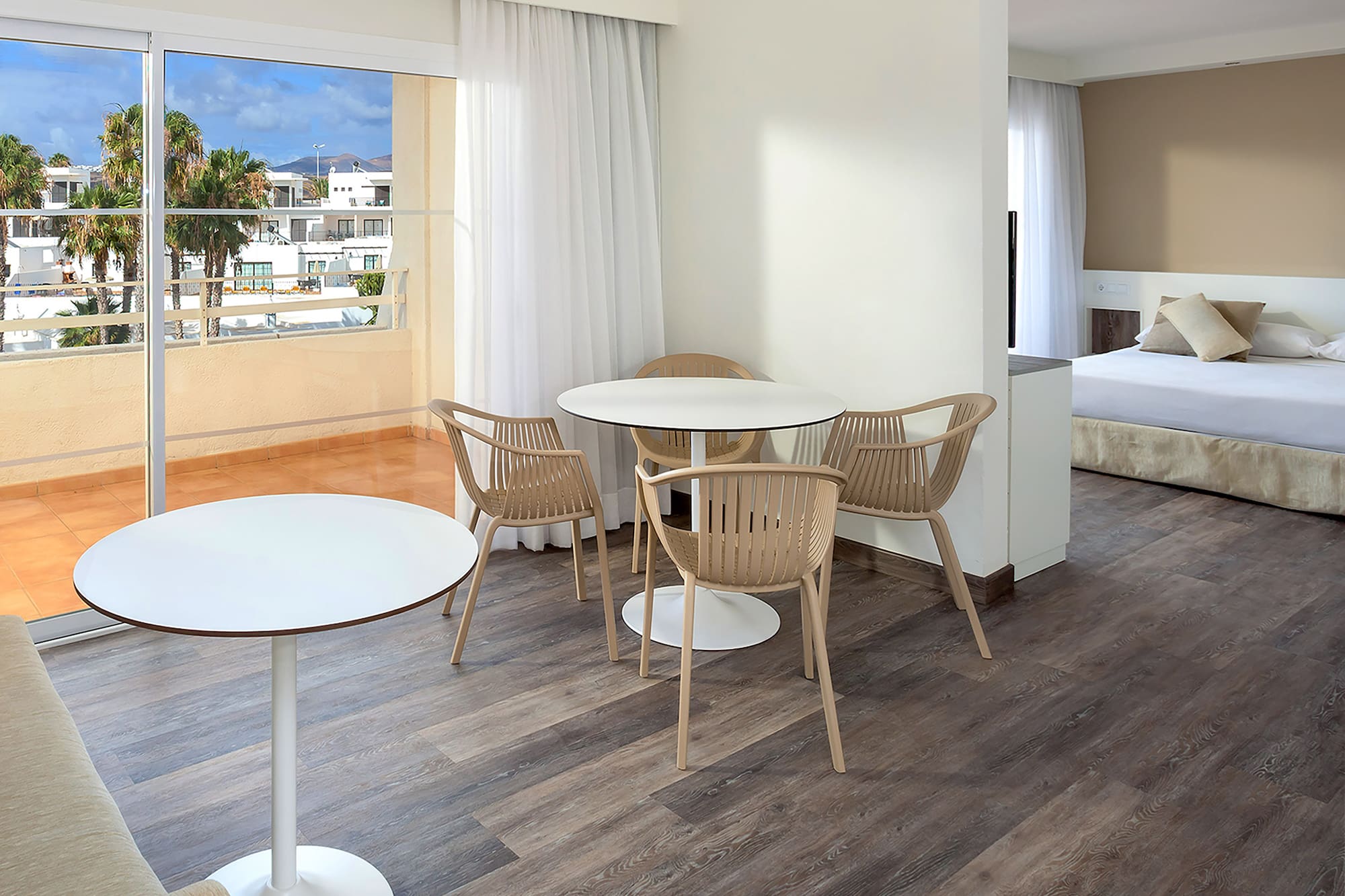 a room with a table and chairs