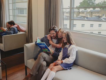 a group of people sitting on a couch