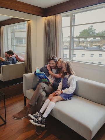 a group of people sitting on a couch