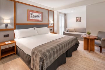 a room with a bed and a couch