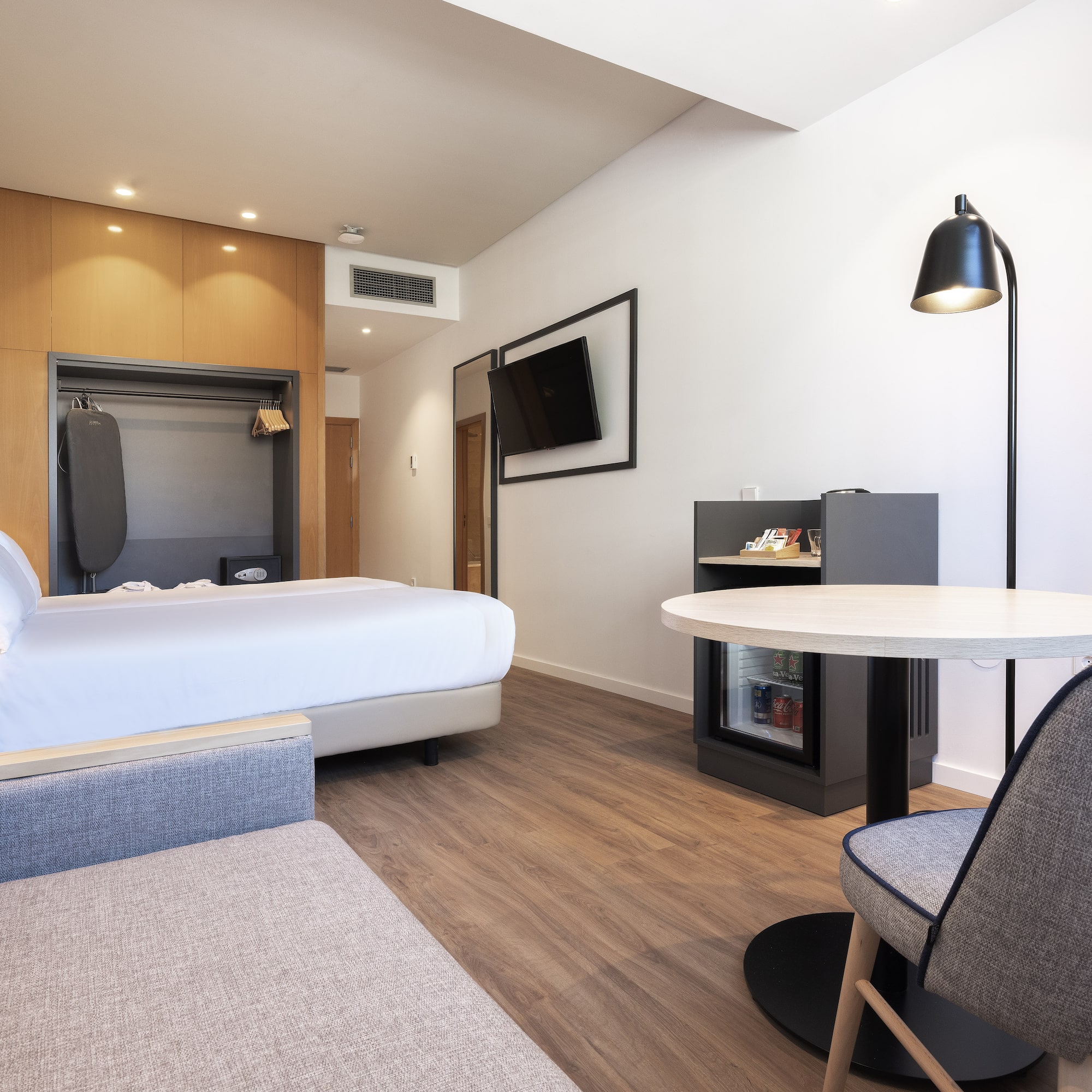 a room with a bed and a table