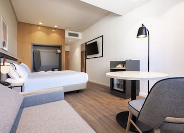 a room with a bed and a table