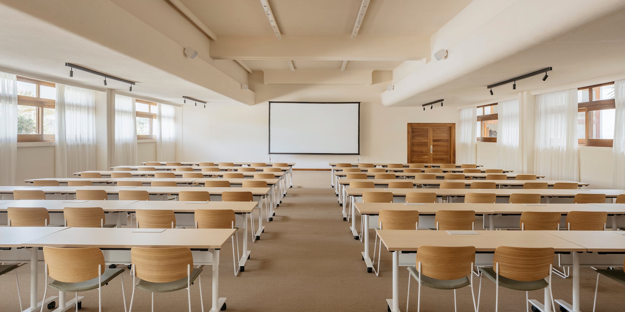a room with desks and chairs