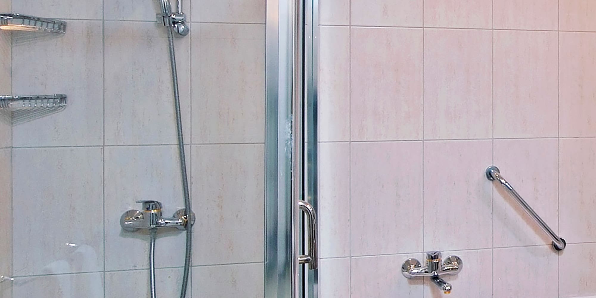 a bathroom with a shower and bathtub