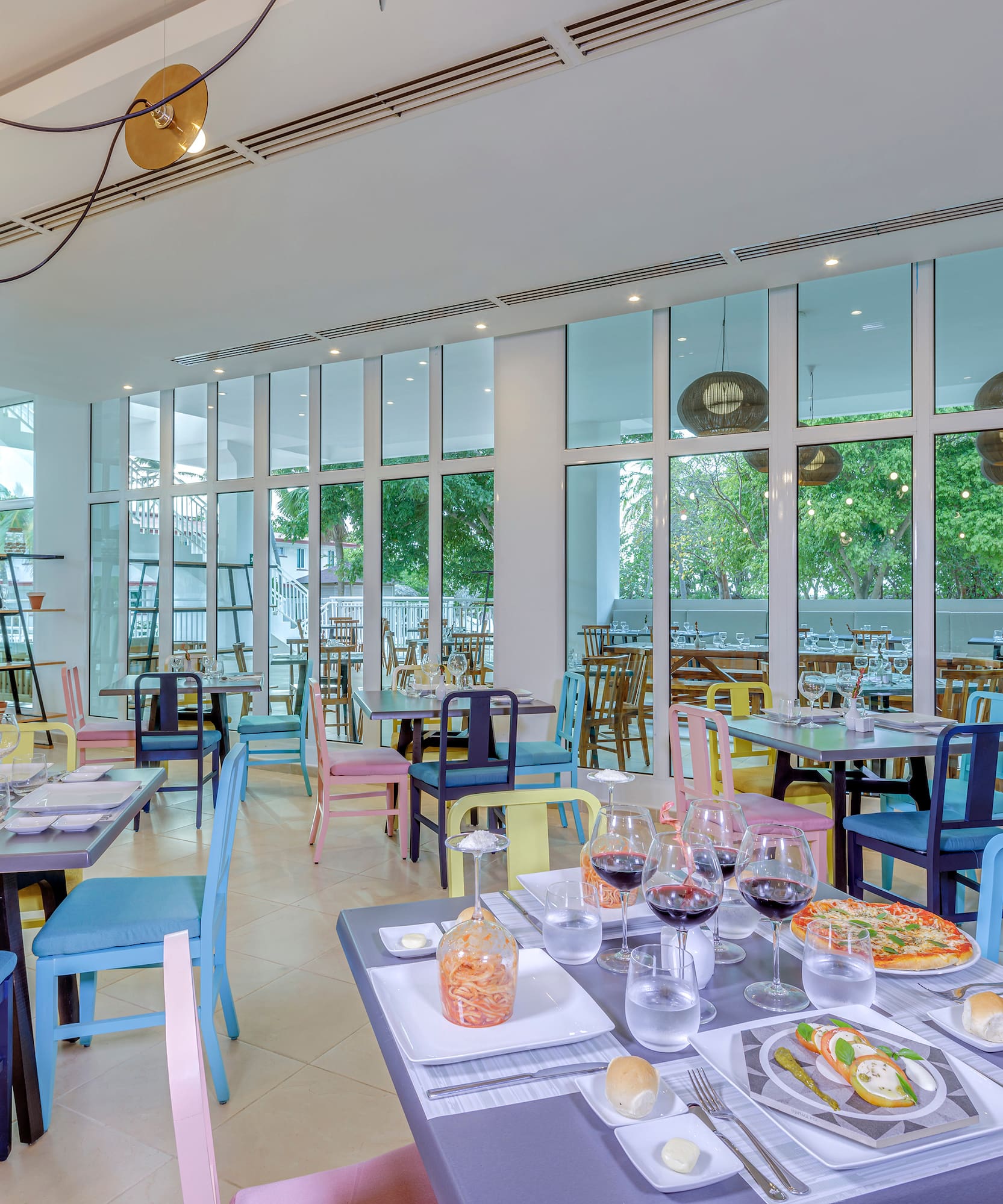 a restaurant with many tables and chairs