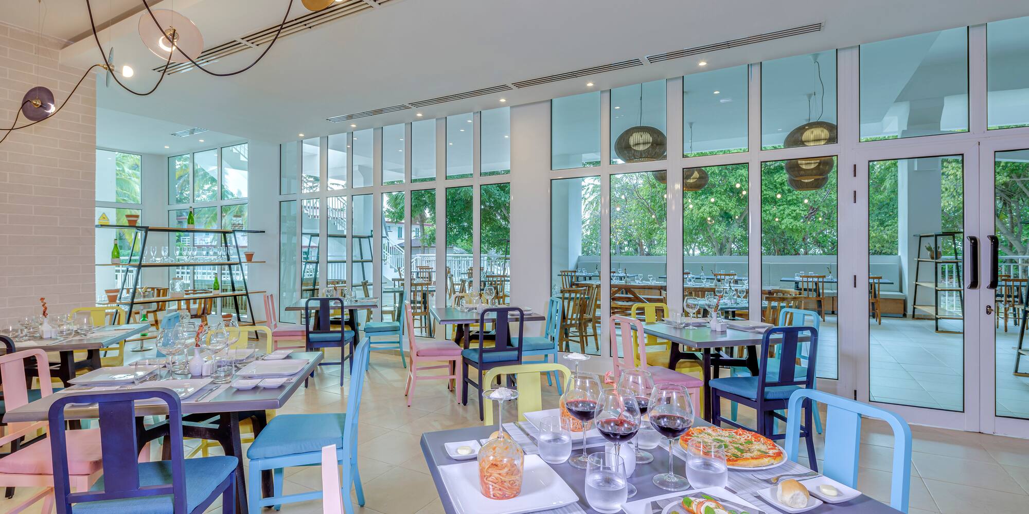 a restaurant with many tables and chairs