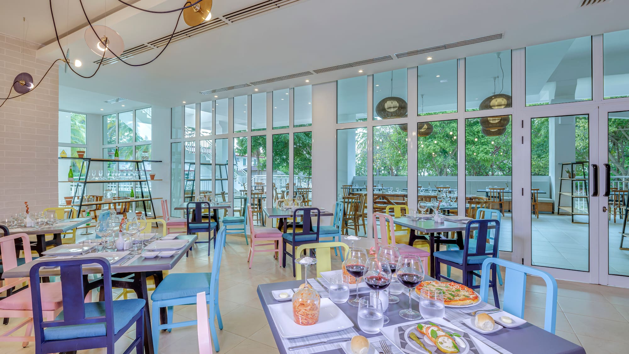 a restaurant with many tables and chairs