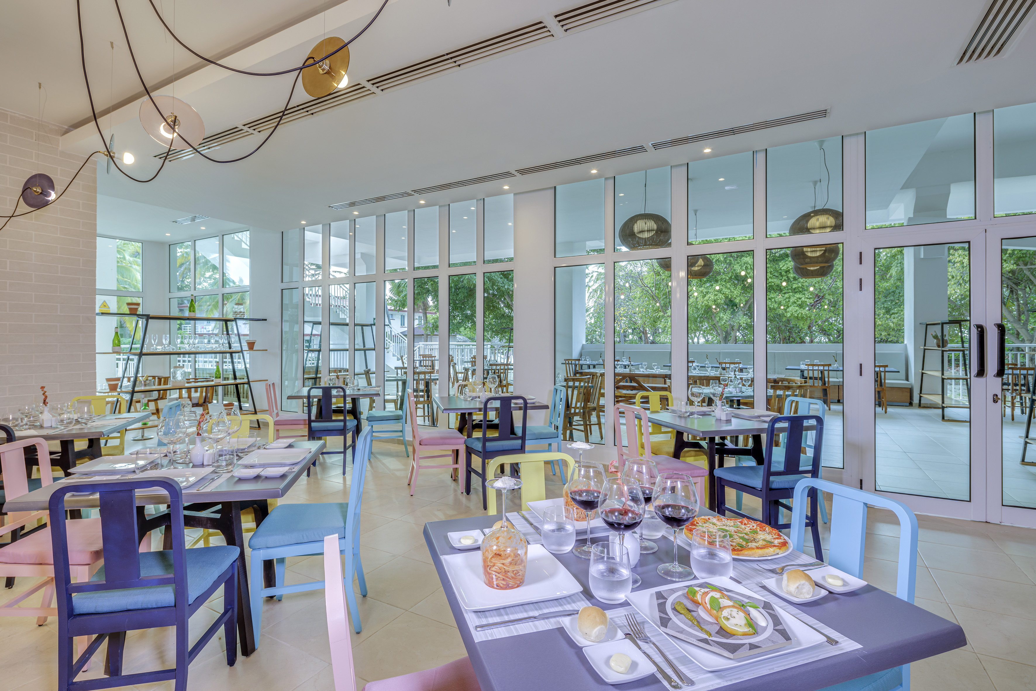 a restaurant with many tables and chairs