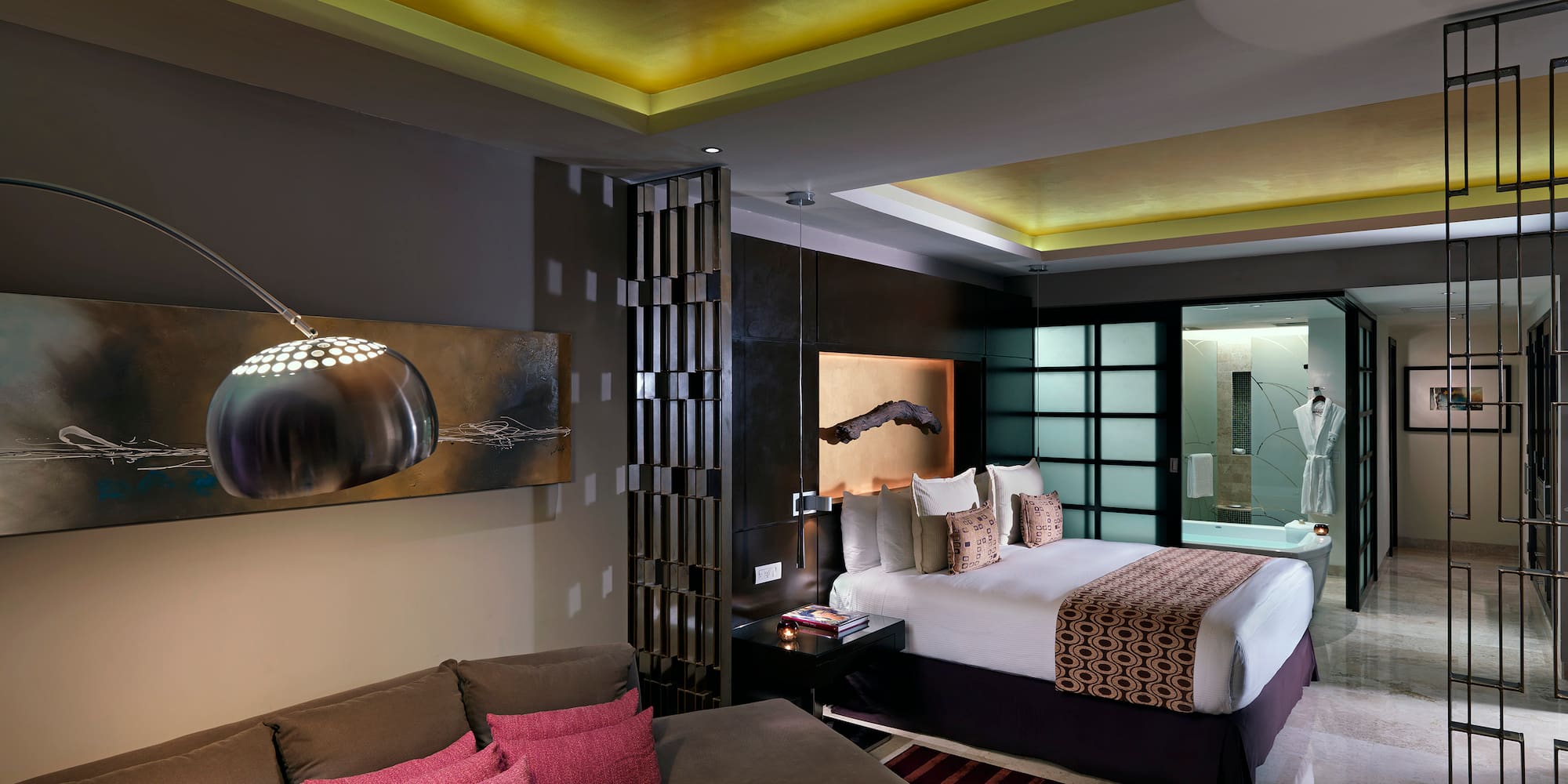 a room with a bed and couch