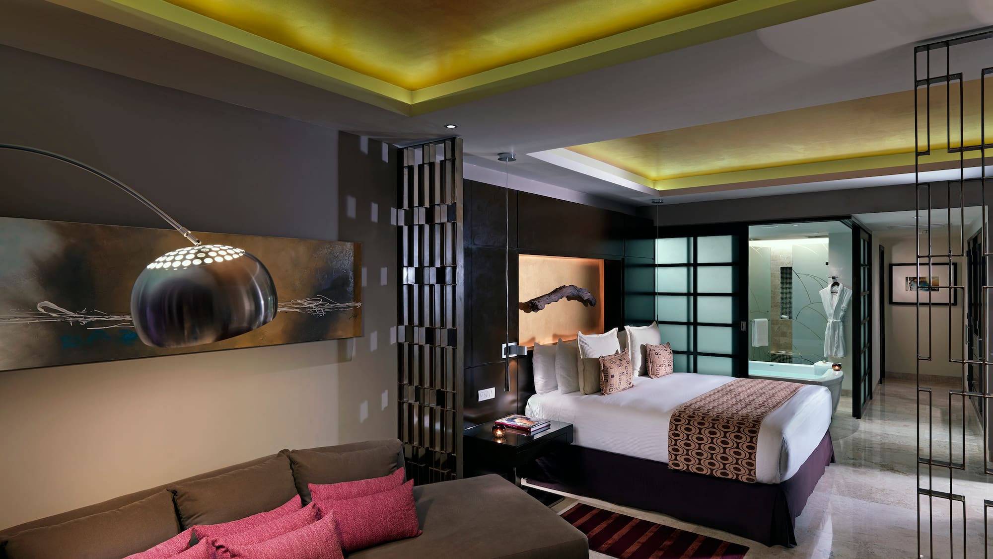 a room with a bed and couch