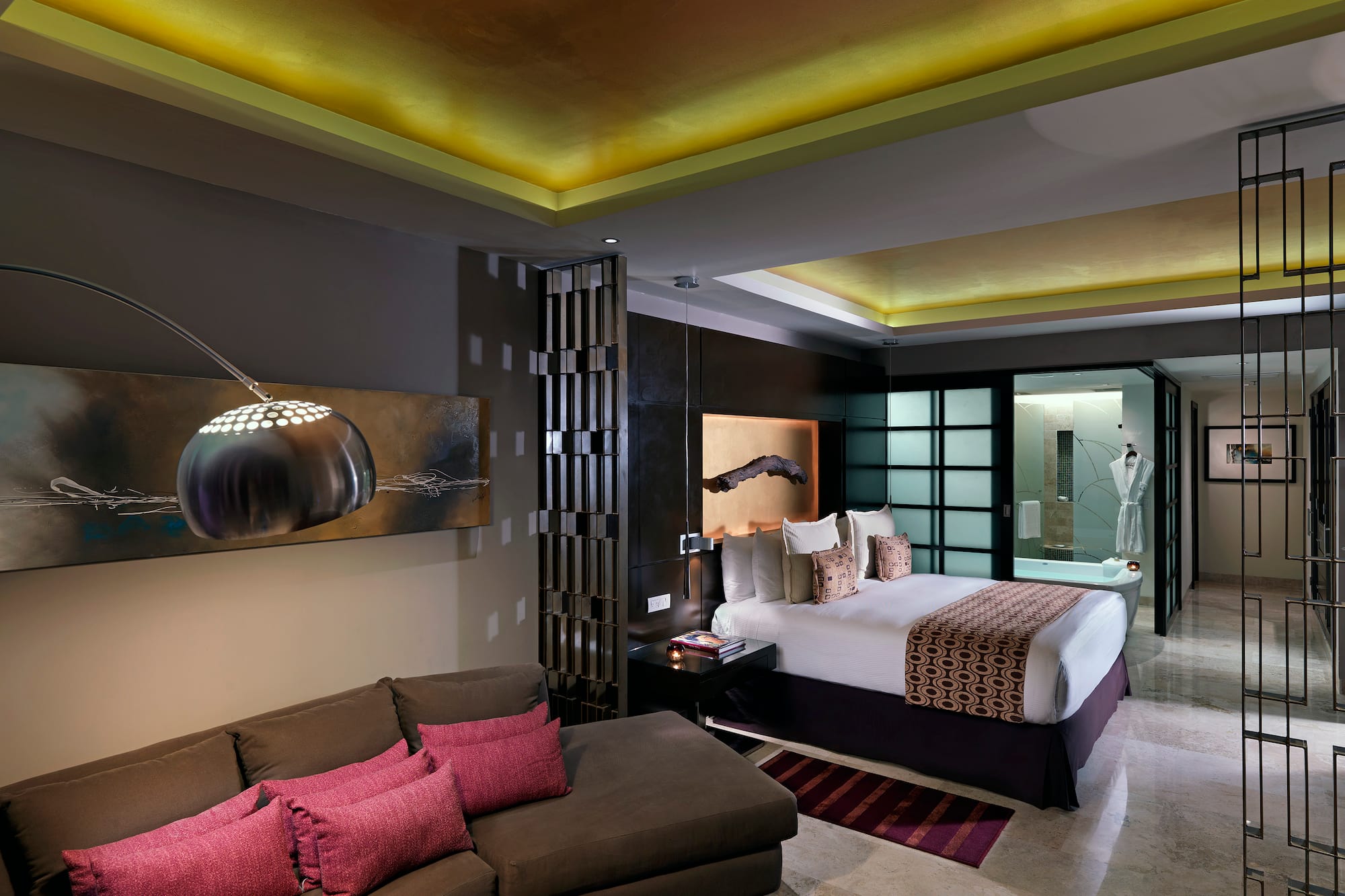 a room with a bed and couch