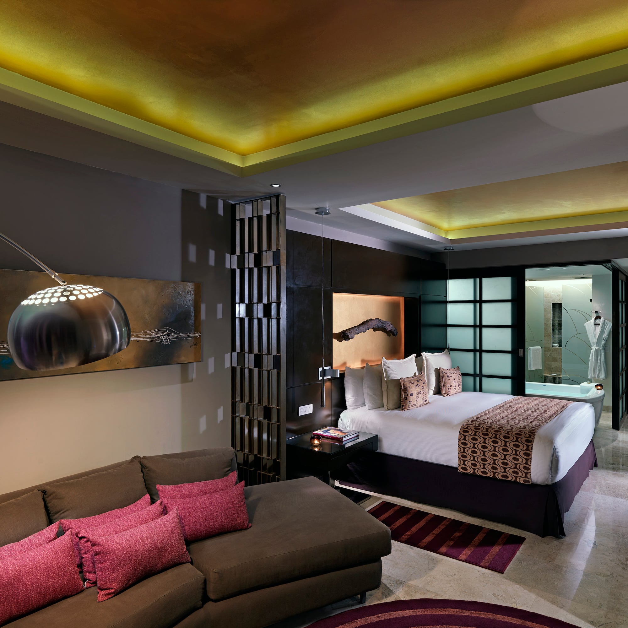 a room with a bed and couch