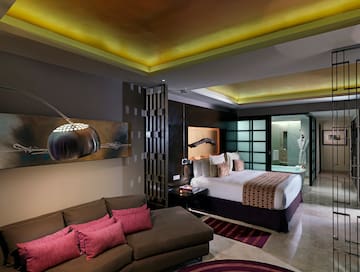 a room with a bed and couch