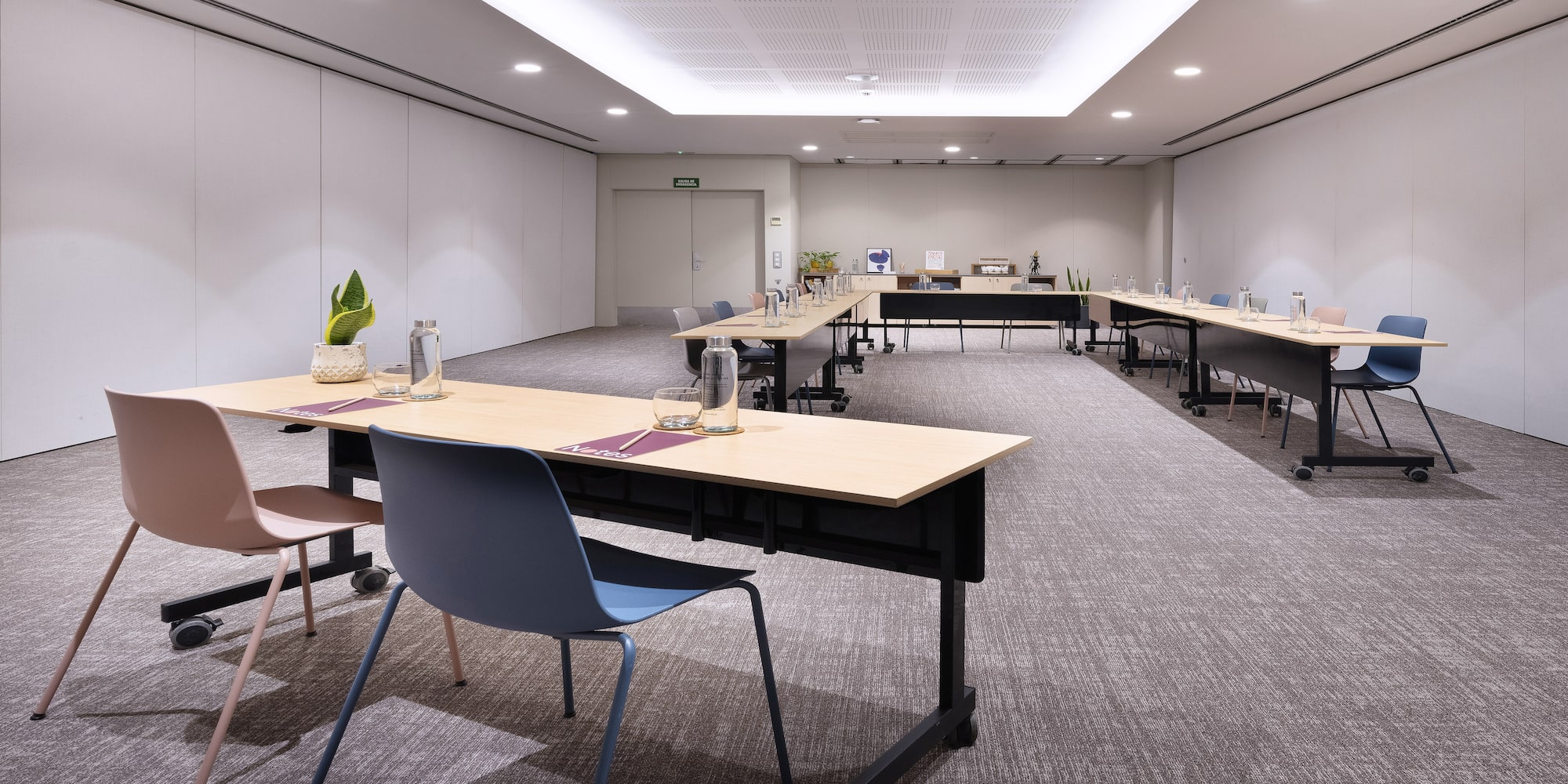 a room with tables and chairs