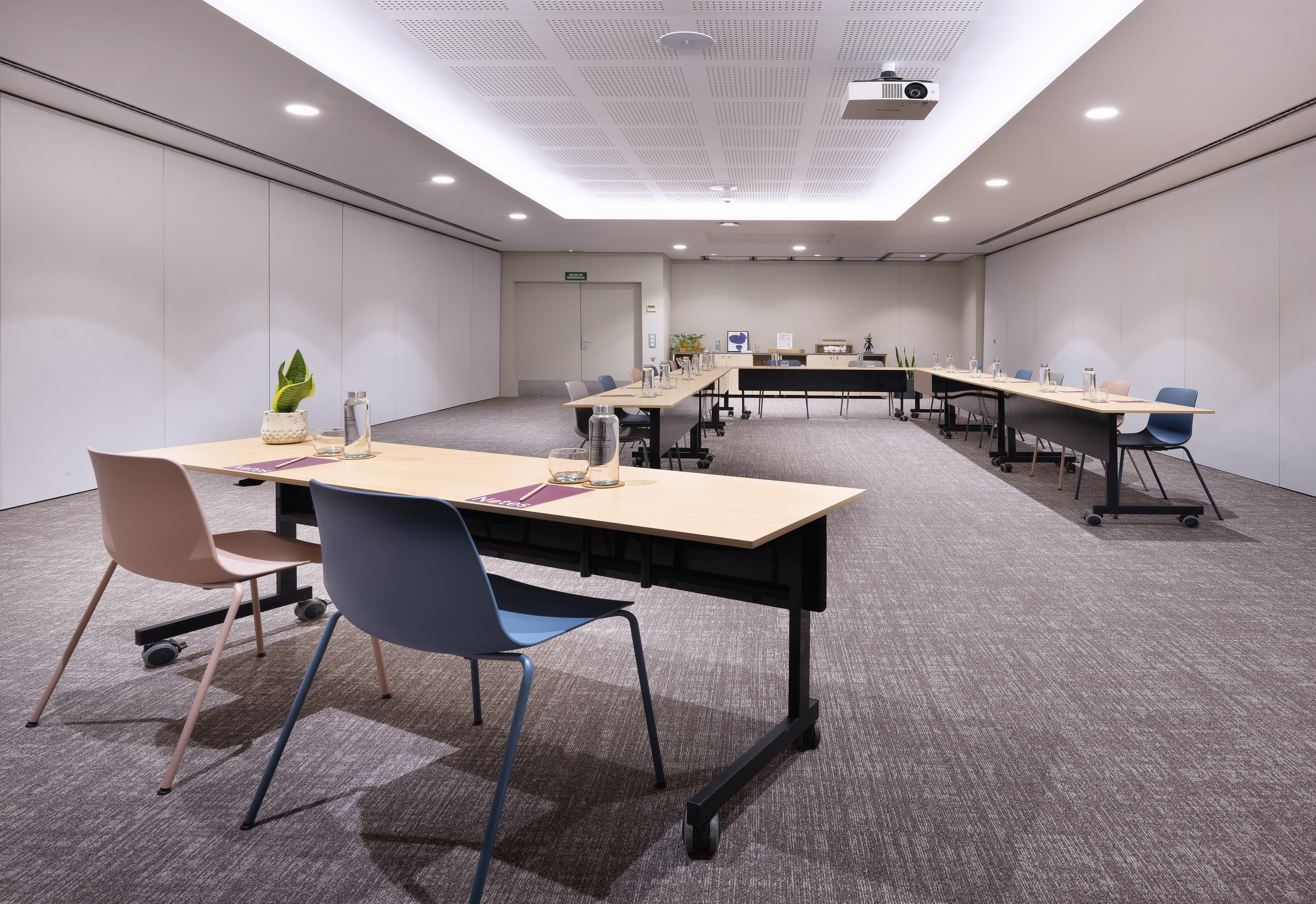 a room with tables and chairs