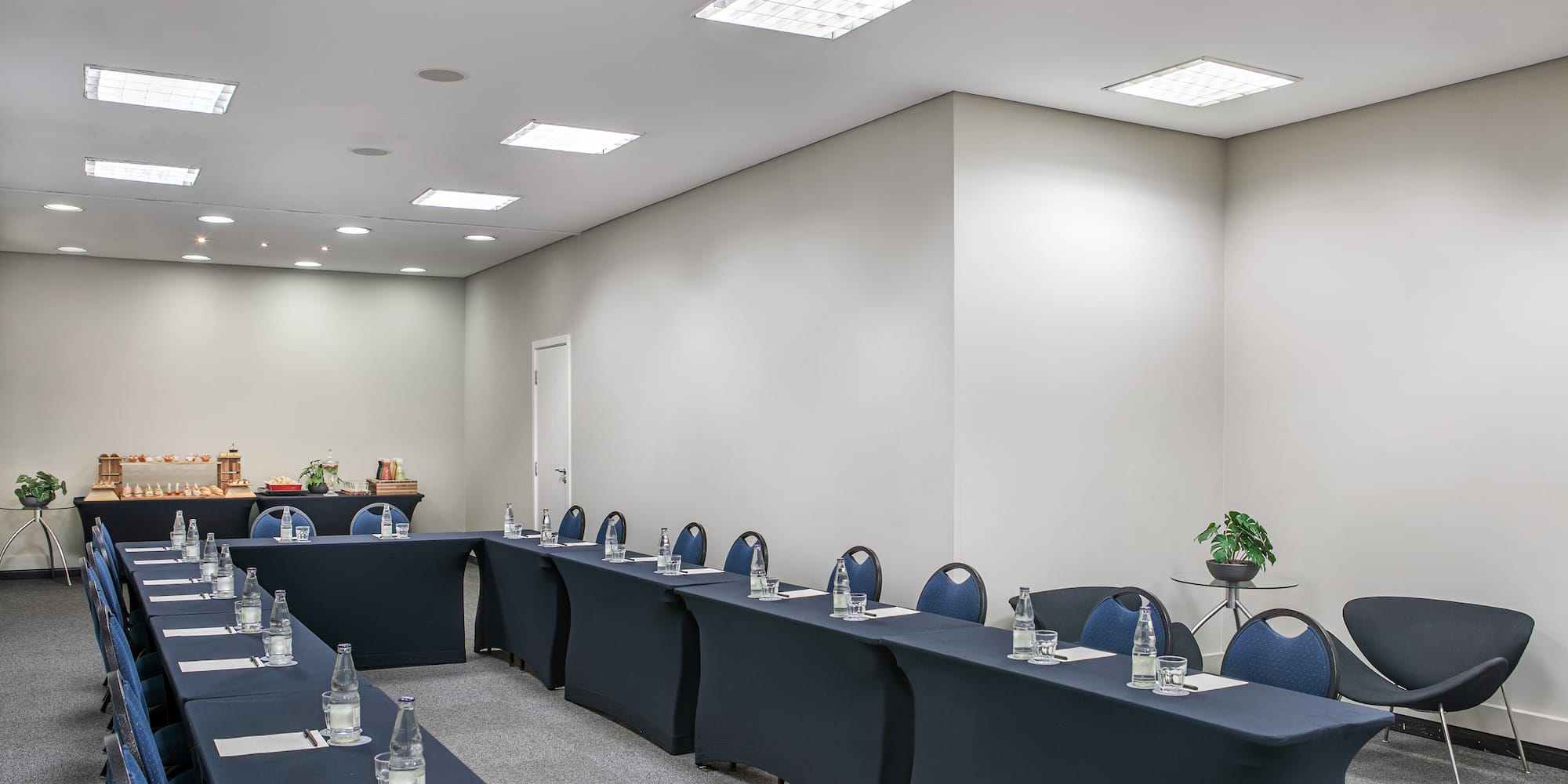 a room with tables and chairs