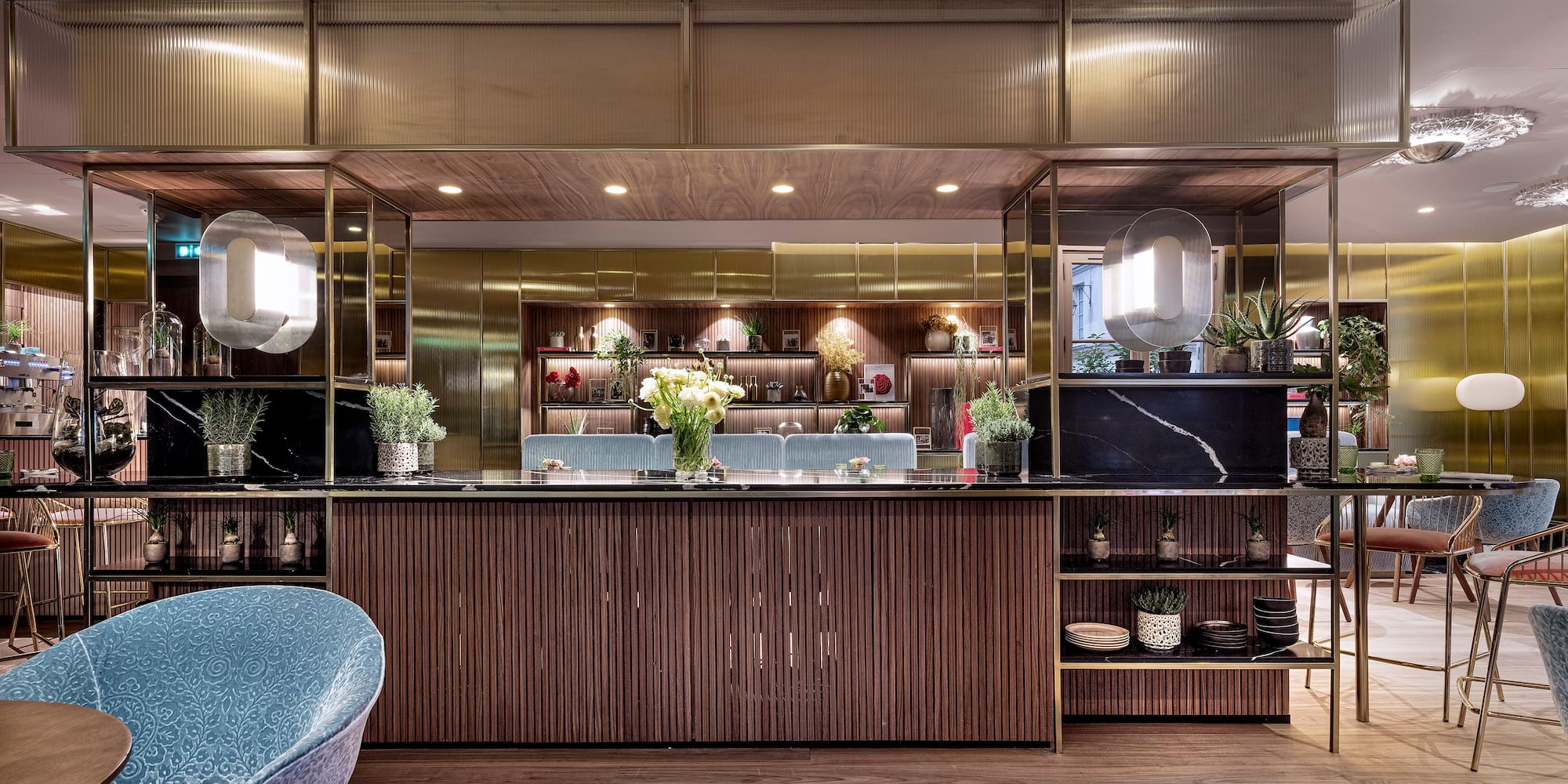 a room with a bar and a mirror wall