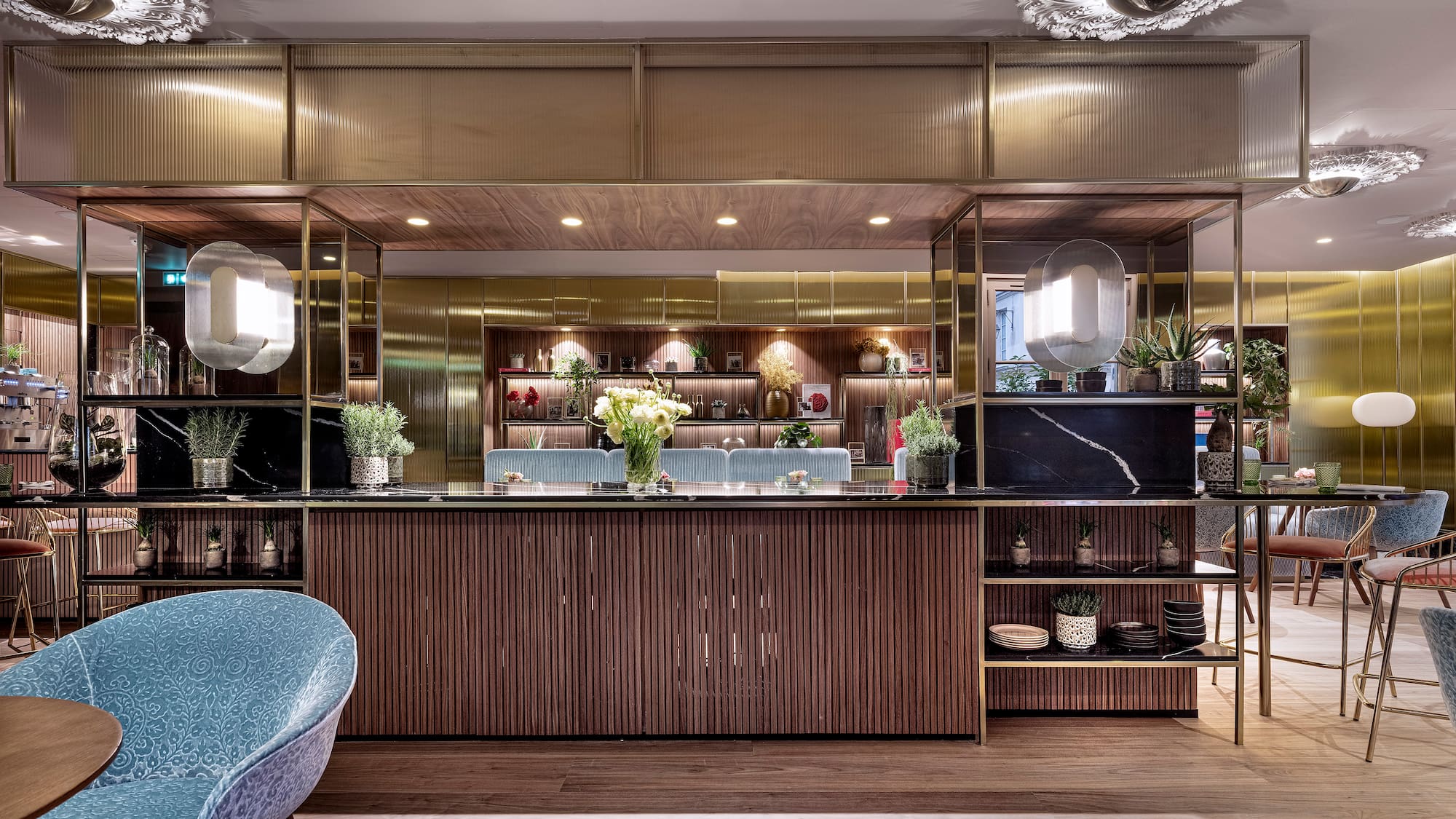 a room with a bar and a mirror wall