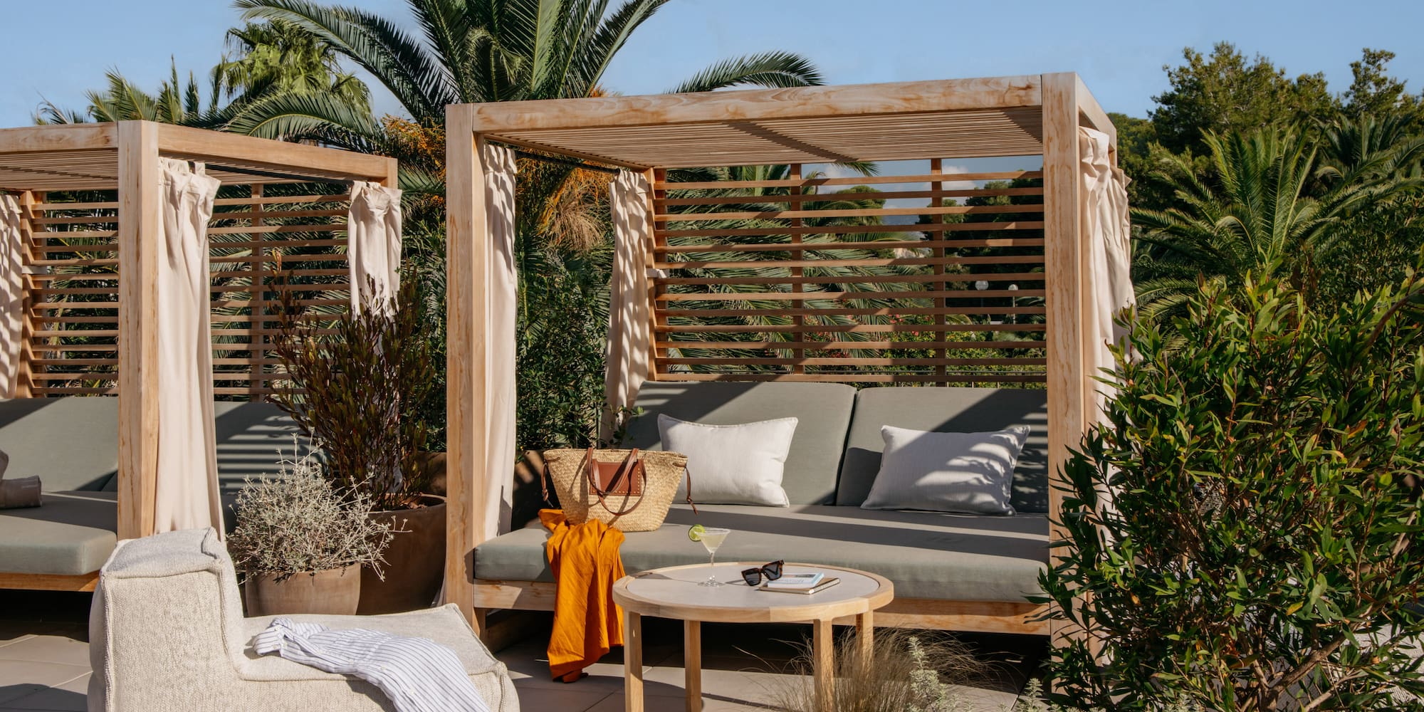 a patio with a couch and a table